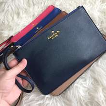 harga pouch kate spade