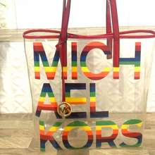 the michael large logo charm clear tote bag